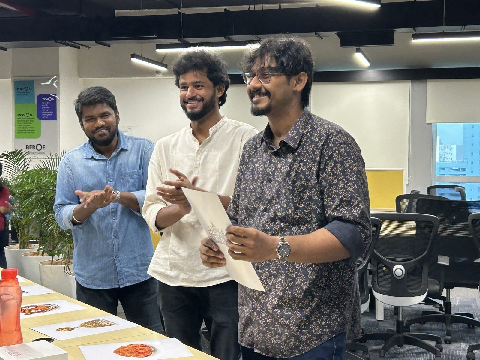 Colleagues laughing during a festival engagement moment