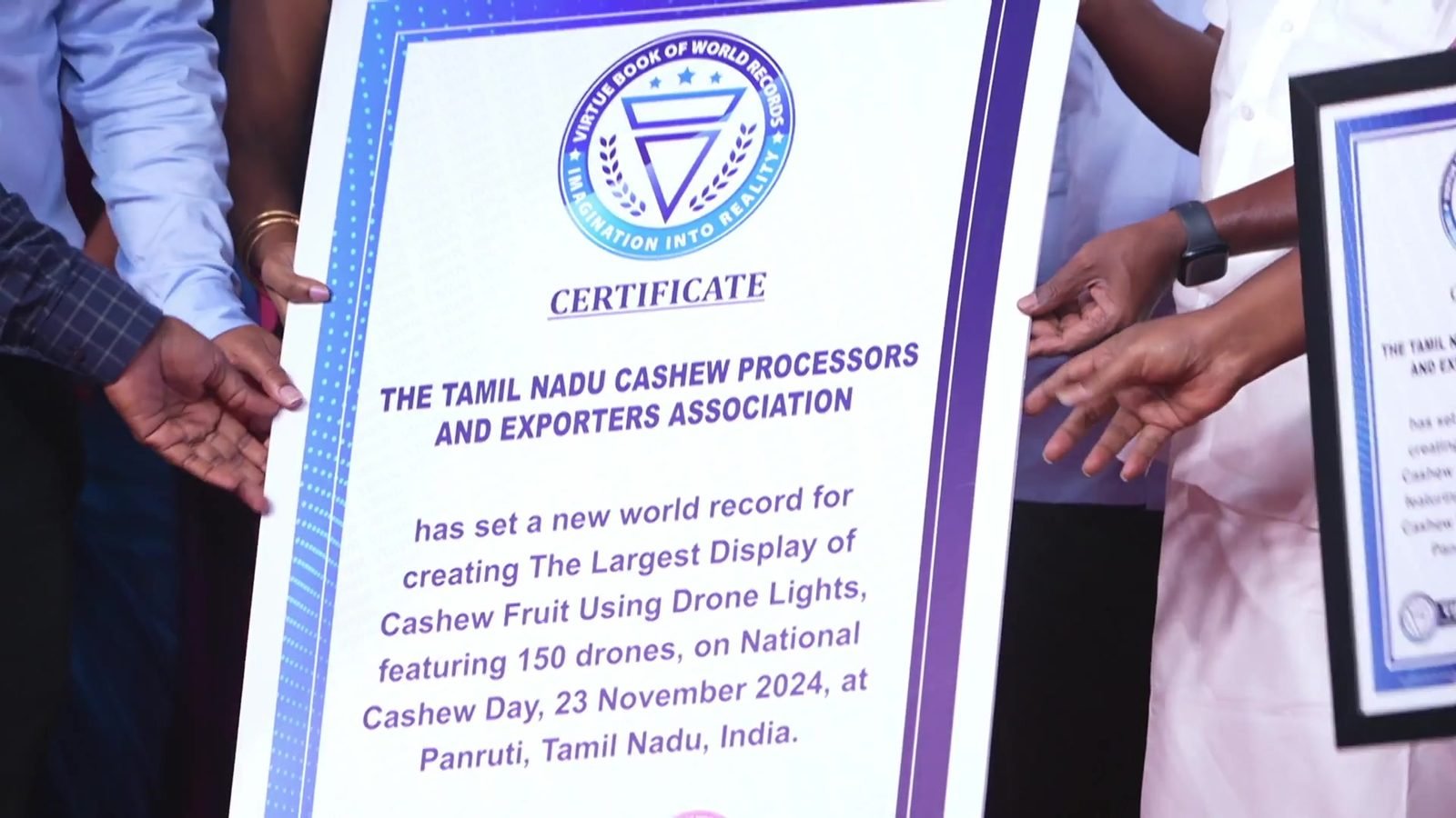 Association members holding the world record certificate