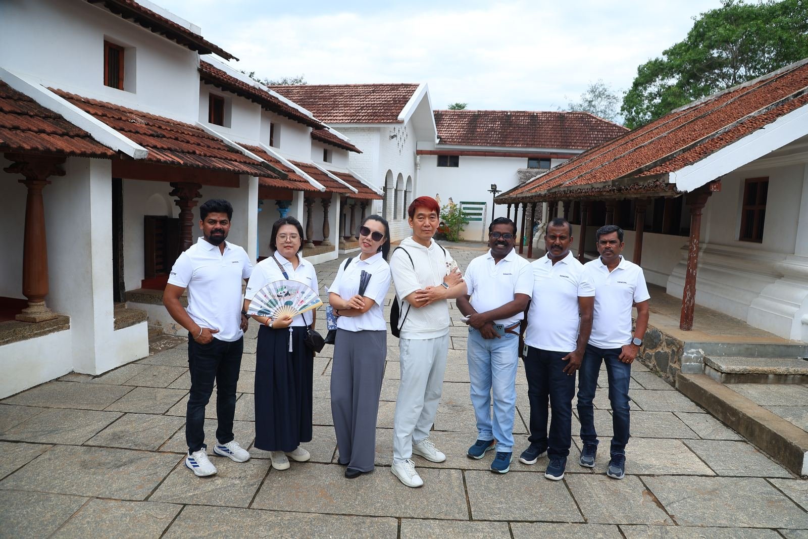 Vestas REFM team leaders from India and China at a heritage courtyard in Chennai