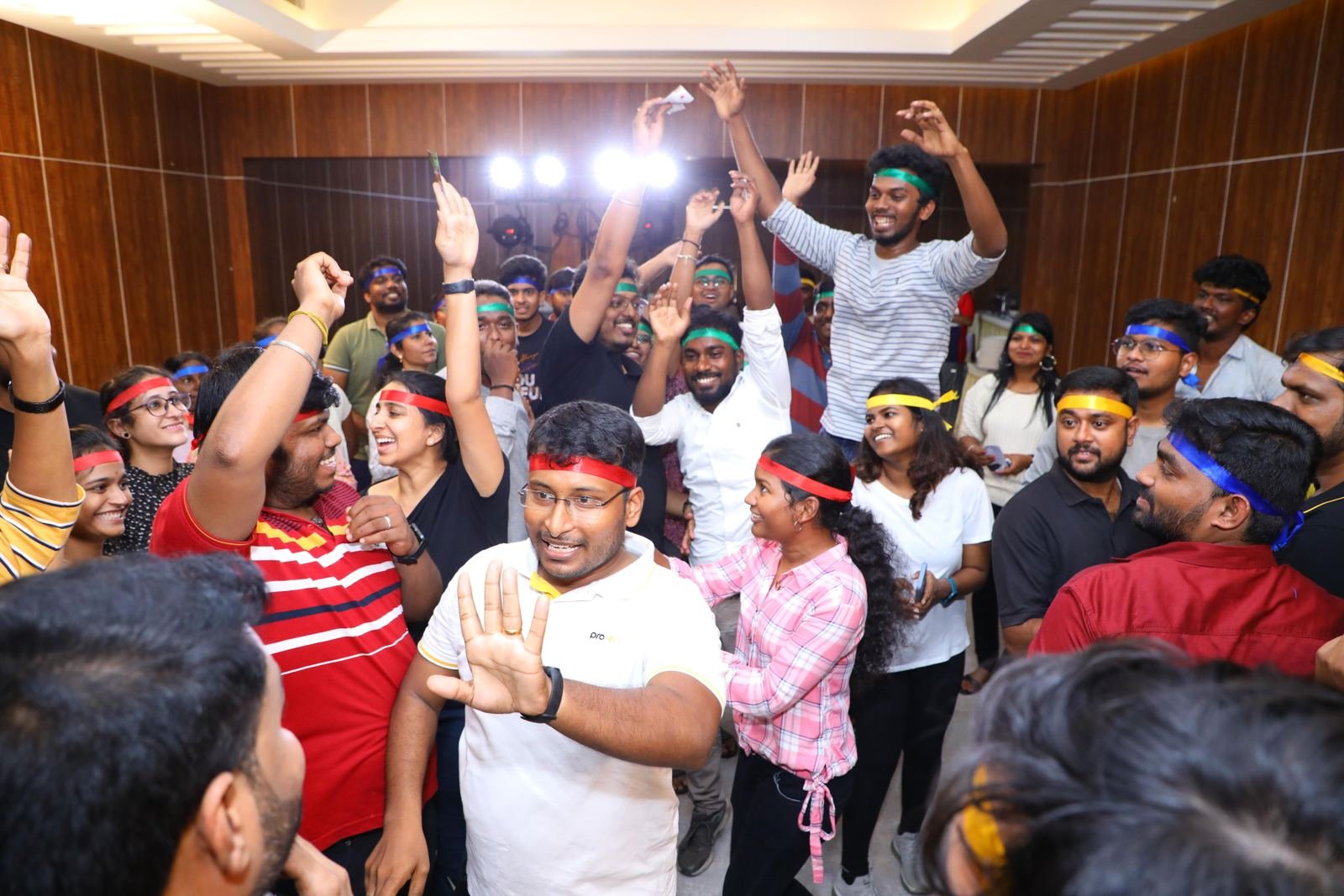 A team cheering together at a Joy Stories session